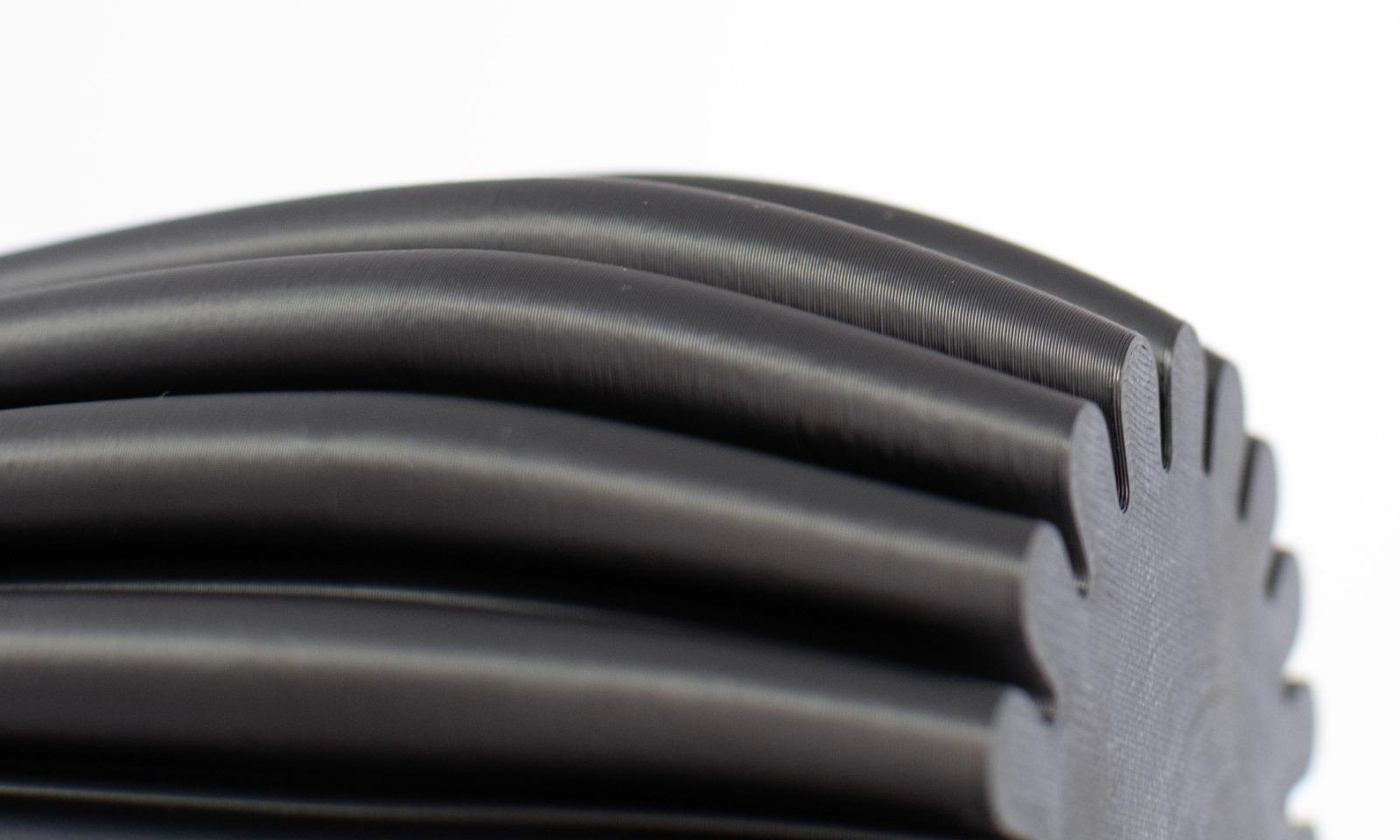 Close-up of the printed ribs, layer lines reading as fine texture