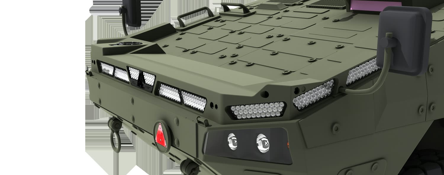 Aveo lighting array on the front of a green 8x8 armored vehicle