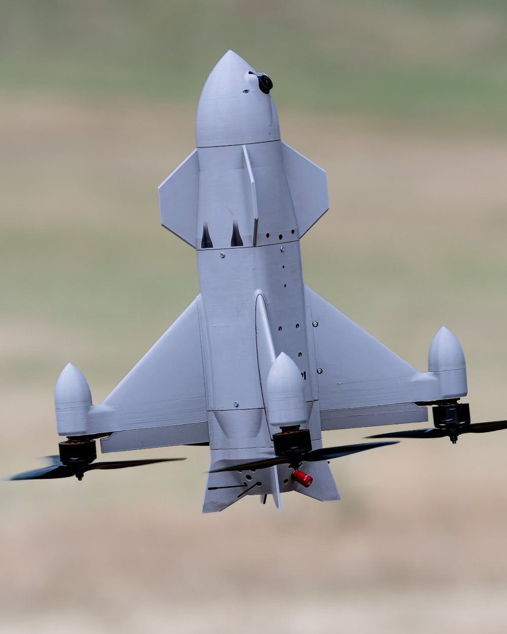 Aveo ConeHead interceptor in flight over a field