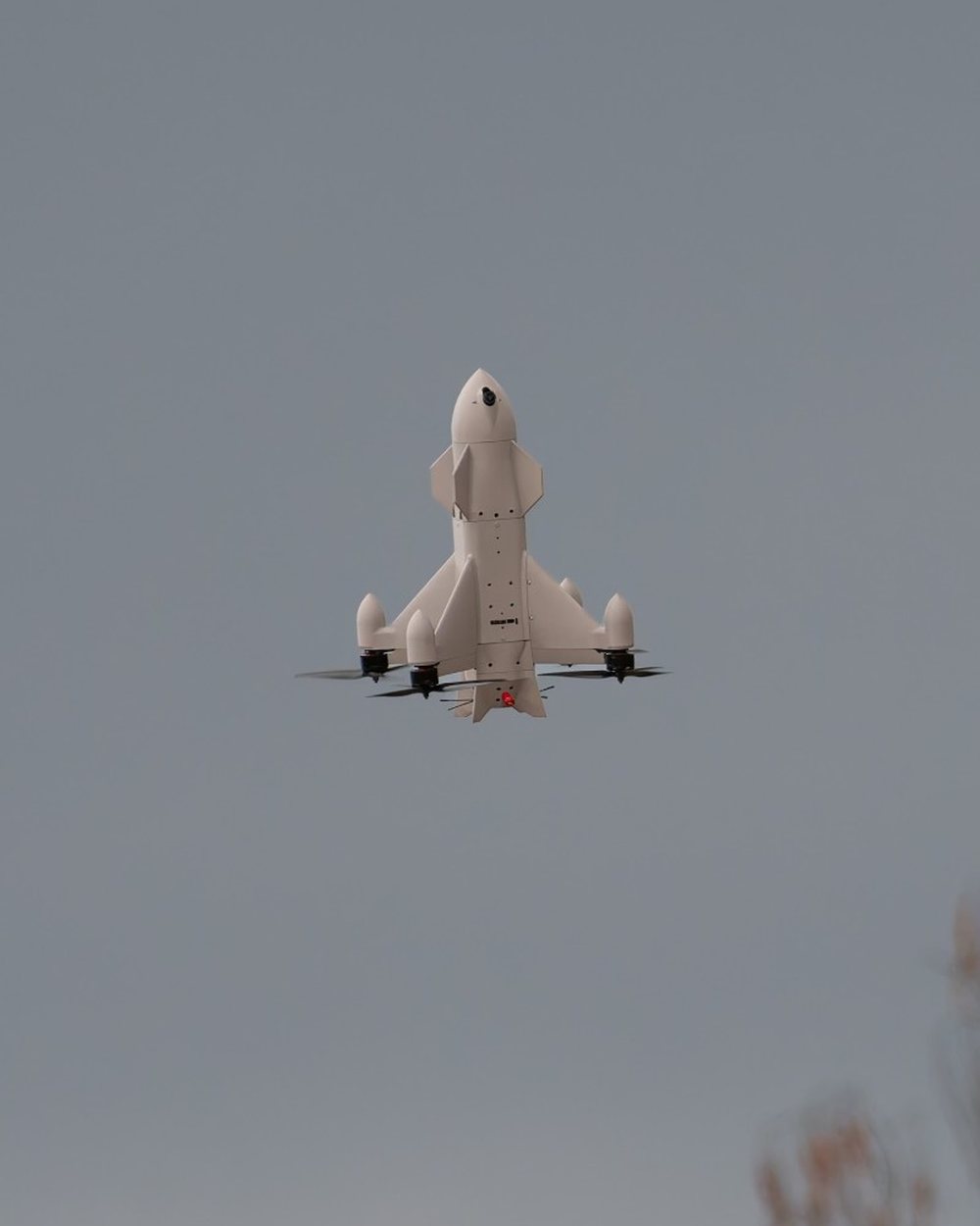 Aveo ConeHead interceptor climbing past treetops