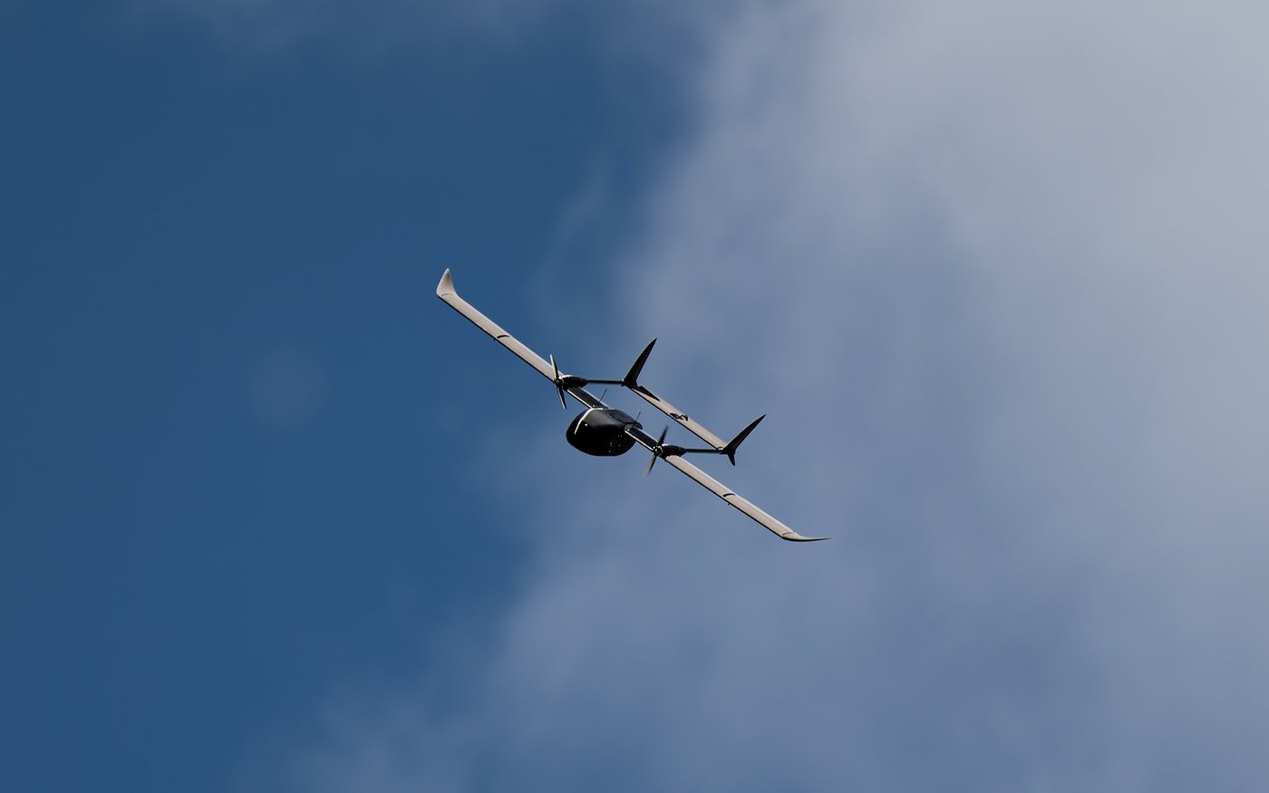 Aveo AirWing F-150 climbing into blue sky